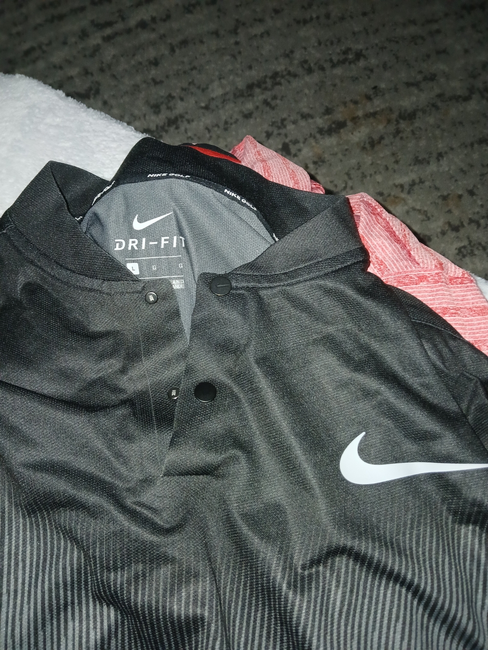 Nike Dri-FIT Black Polo with White Swoosh
